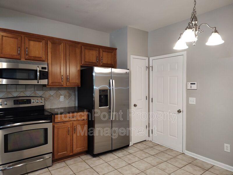Cozy, 2 story End Unit Townhome located in the Blakeney Preserve community! property image