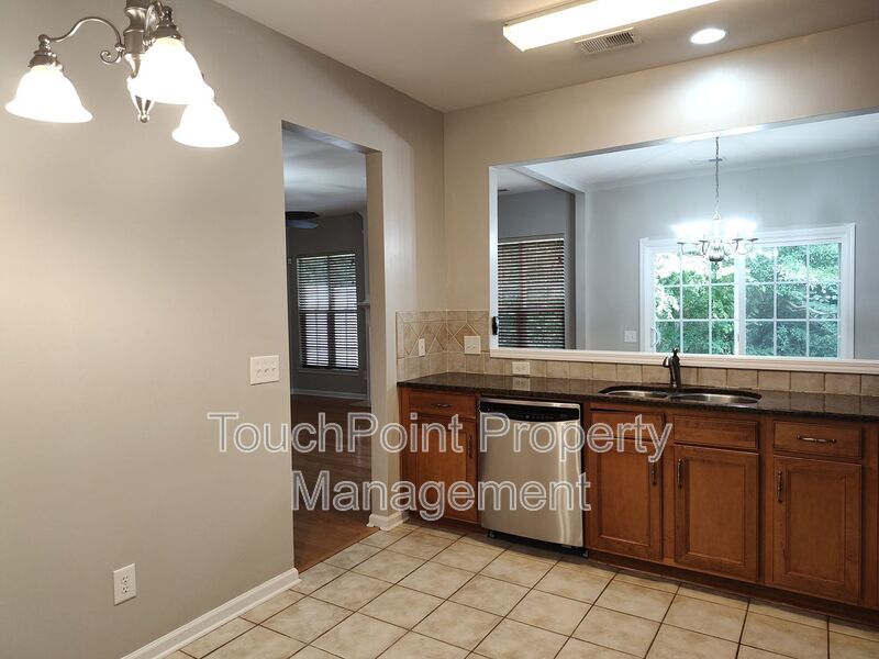 Cozy, 2 story End Unit Townhome located in the Blakeney Preserve community! property image