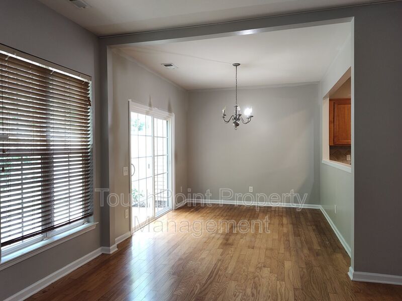 Cozy, 2 story End Unit Townhome located in the Blakeney Preserve community! property image