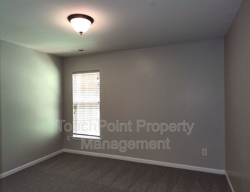 Cozy, 2 story End Unit Townhome located in the Blakeney Preserve community! property image