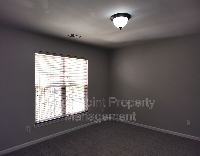 Cozy, 2 story End Unit Townhome located in the Blakeney Preserve community! property image