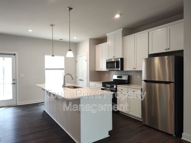 Beautiful End Unit Townhome located in the Towns at Mallard Mills community! property image