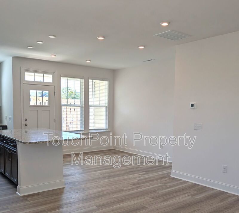 Pristine End Unit Townhome located in the Odell Park Community! property image
