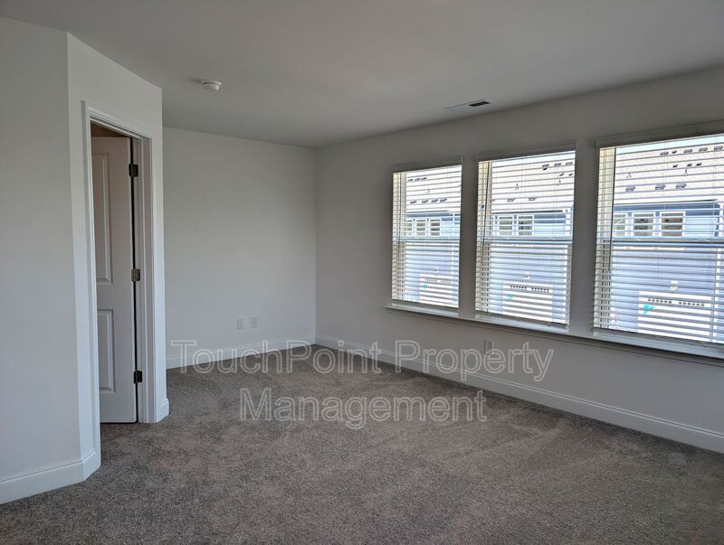 Pristine End Unit Townhome located in the Odell Park Community! property image