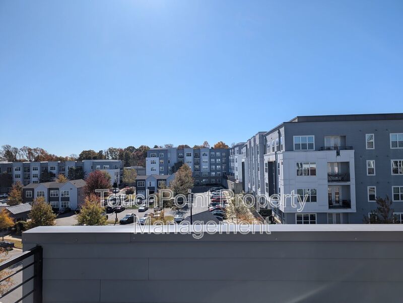 End-unit townhome in Bryant Park Terrace! 2-beds, 2-full baths, and 2-half baths. property image