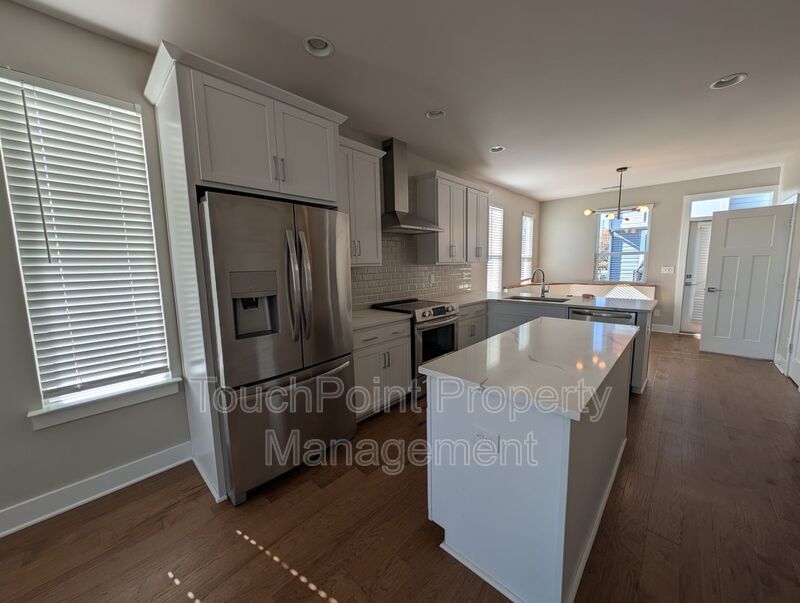 End-unit townhome in Bryant Park Terrace! 2-beds, 2-full baths, and 2-half baths. property image