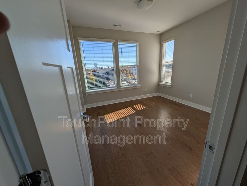 End-unit townhome in Bryant Park Terrace! 2-beds, 2-full baths, and 2-half baths. property image