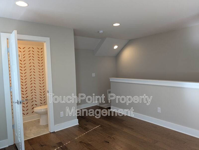 End-unit townhome in Bryant Park Terrace! 2-beds, 2-full baths, and 2-half baths. property image