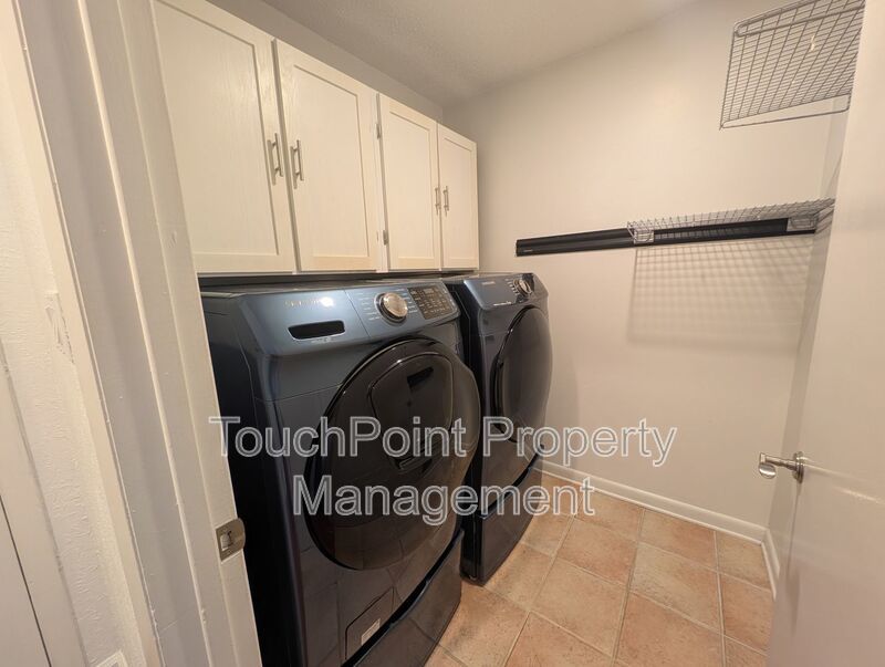 Charming 4 bedroom, 2.5 bath home located in the Raintree Community! property image