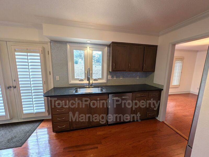 Charming 4 bedroom, 2.5 bath home located in the Raintree Community! property image