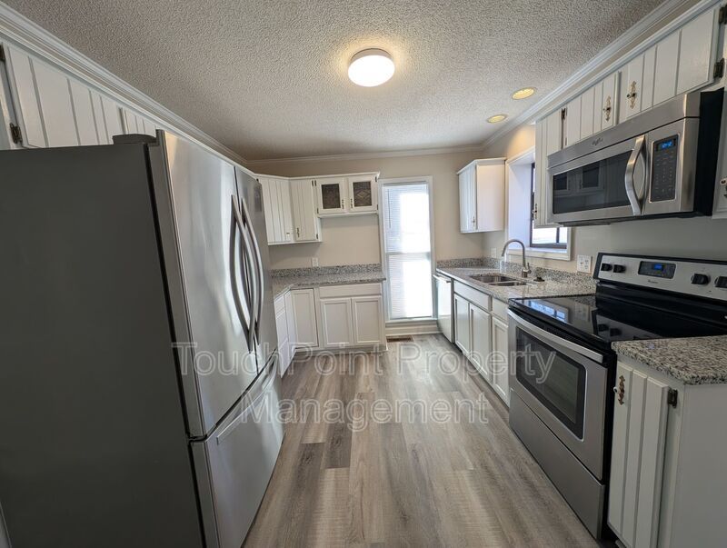 Gorgeous Brick 4 bedroom, 4 bathroom home located in the Farmwood community in Minthill! property image