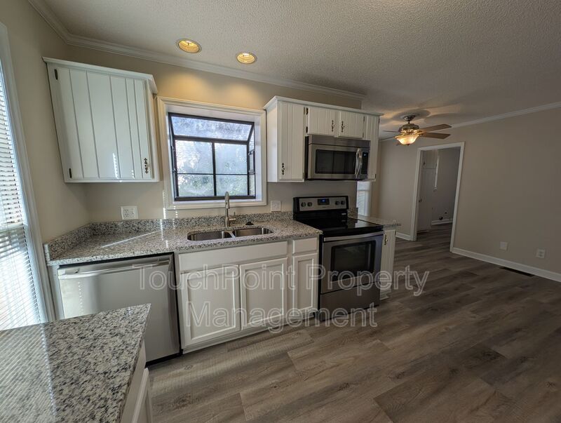 Gorgeous Brick 4 bedroom, 4 bathroom home located in the Farmwood community in Minthill! property image