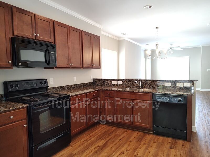 Corner Unit Townhome located in the Village Park Community! property image