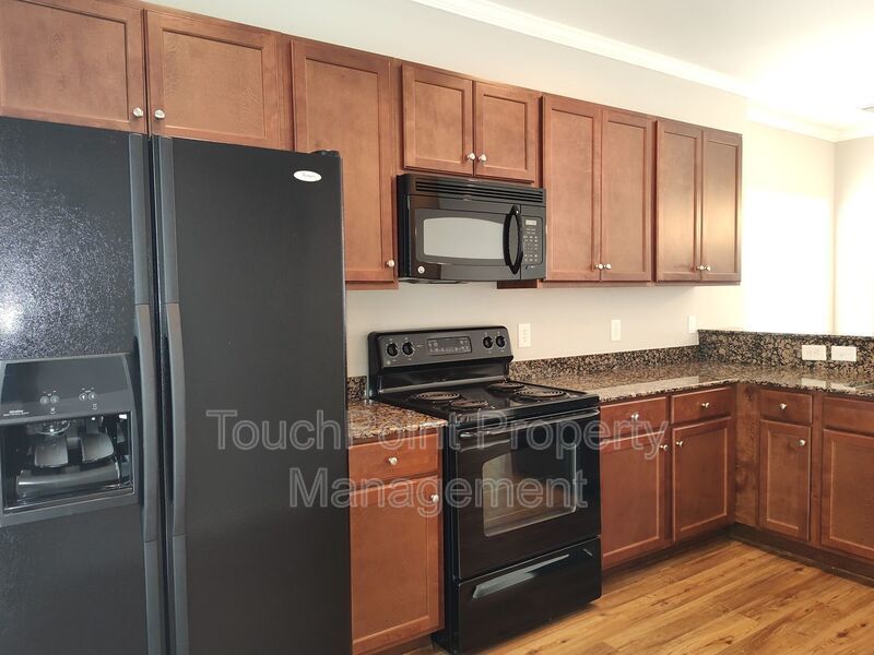 Corner Unit Townhome located in the Village Park Community! property image