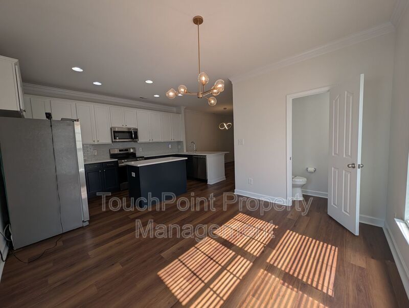 Pristine End Unit Townhome located in the Prosperity Place community! property image