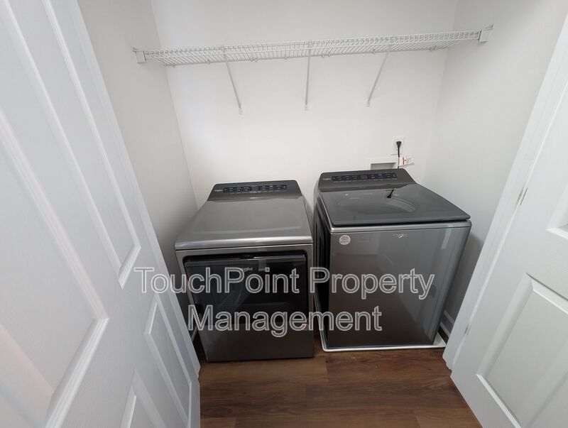 Pristine End Unit Townhome located in the Prosperity Place community! property image