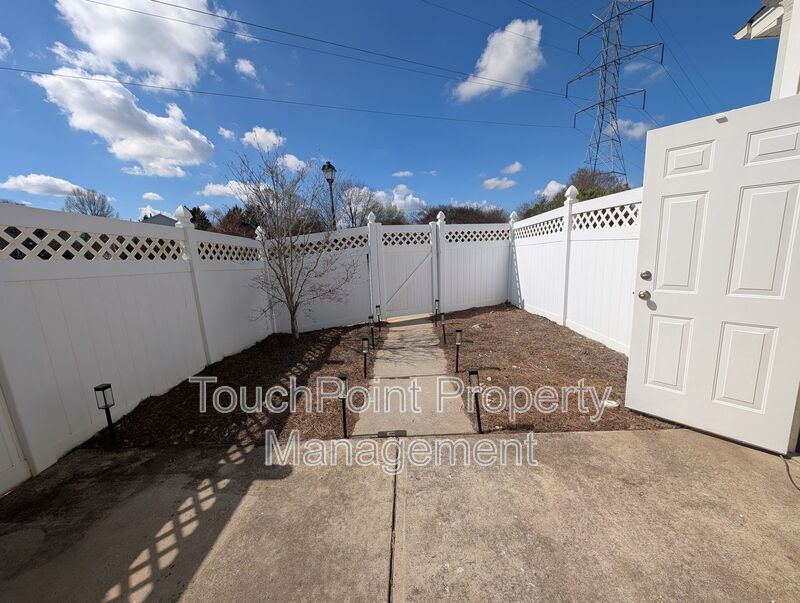 Pristine End Unit Townhome located in the Prosperity Place community! property image